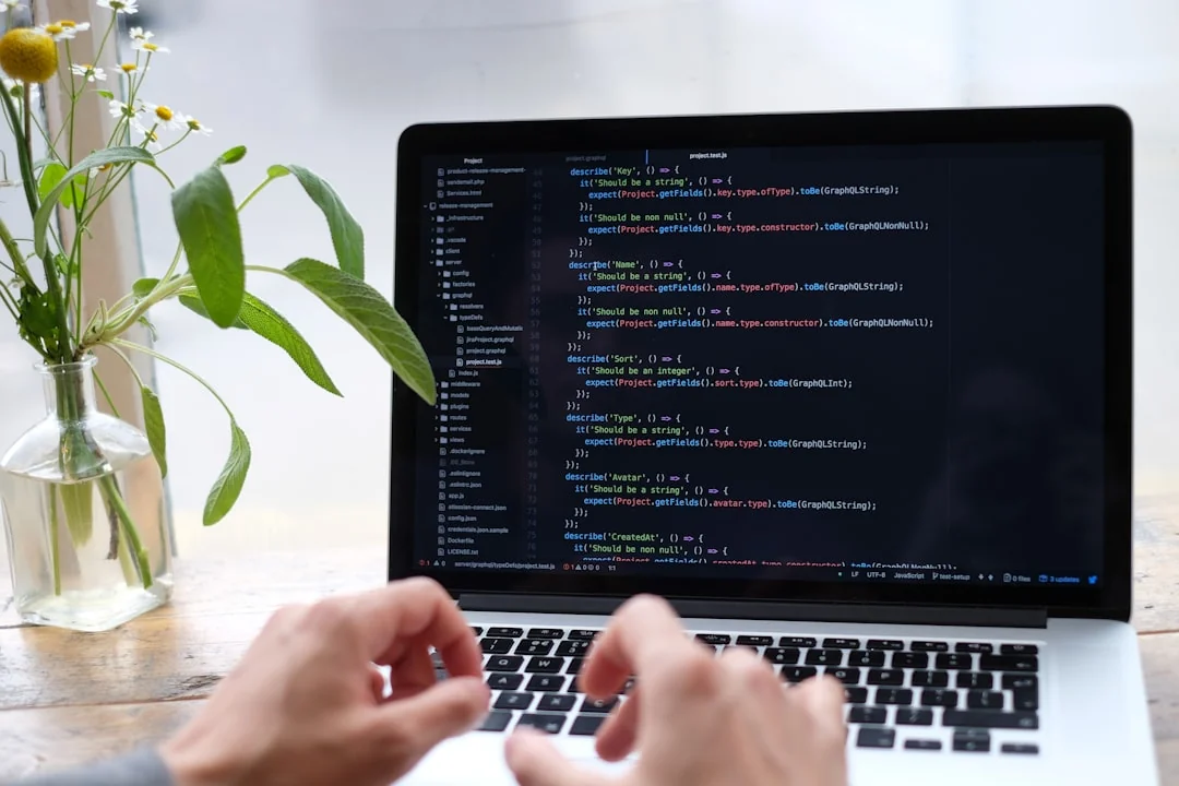 A modern computer screen displaying web design work, showcasing creative visuals in a workspace.
